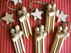 wooden pegs with stars on them are arranged in the shape of men and women