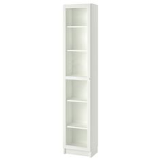 a tall white bookcase with three shelves