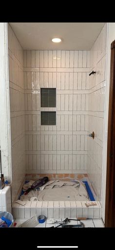 the bathroom is being remodeled and ready to be used as a shower stall or toilet