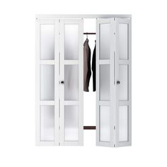 an open white closet with clothes hanging on it