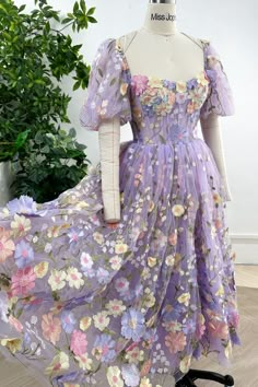 Lavender Corset Dress, Elegant Puff Sleeve Dresses With Floral Embroidery, Elegant Floral Embroidered Puff Sleeve Dresses, Elegant Lavender Puff Sleeve Dress, Fitted Lavender Embroidered Dress, Puff Sleeve Dress With Floral Embroidery For Garden Party, Purple Organza Dress With Floral Embroidery, Lavender Fitted Puff Sleeve Dress, Lavender Fitted Dress With Puff Sleeves