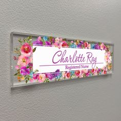 Acrylic Sign, Office Door Name Plate, For Desk Decor Aesthetic, New Job Gift, Custom acrylic nameplate wall sign, floral design. Enter custom name. Job title (optional).  Each custom acrylic plaque measures 9 inches x 2.25 inches x 0.16 inch thick. Choose your mounting preference between either: x2 double-sided reusable and removable adhesive mounting dots (strictly for wall/door mounts). Or x2 standoffs with hardware included (for either walls or desks). Acrylic nameplates are an affordable and Office Door Name Plates, Desk Decor Aesthetic, Door Name Plates, Door Name, Personalized Name Plates, Office Door, New Job Gift, Acrylic Plaque, Aesthetic Decor