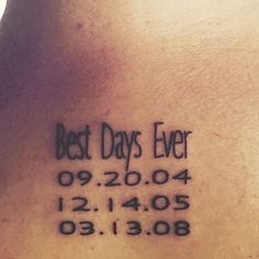 the back of a man's neck with his name and date tattooed on it