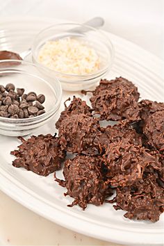 chocolate cookies and other ingredients on a white plate