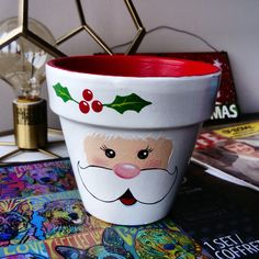 a christmas planter sitting on top of a table