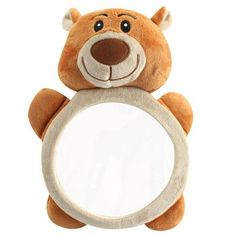 a teddy bear holding a mirror with its paws on it's back and eyes closed