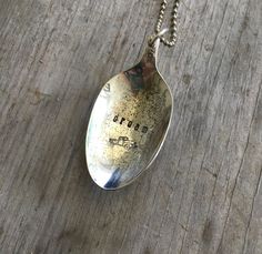 a spoon that has some writing on it