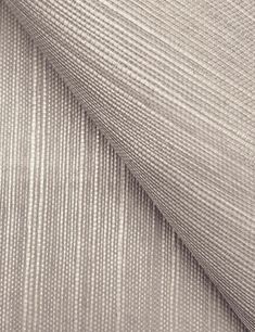 a white fabric textured with thin lines on the outside, and an off - white background