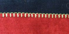 the stitching on this red and blue fabric is very close to it's edge