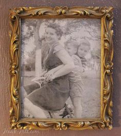 an old photo of a woman holding a baseball bat