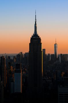 the empire building in new york city at sunset