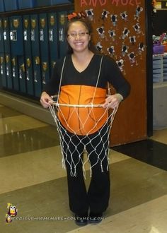 a woman is holding a basketball net in her hands