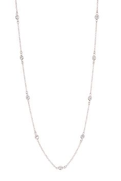 Gold-tone or silver-tone bezel set CZ station endless necklace. No clasp. slips on over head. Approx. 60" length. Approx. 5mm station width. Imported Hanging Necklaces, Station Necklace, Bezel Setting, Silver Necklaces, Chains Necklace, Womens Jewelry Necklace, Nordstrom Rack, Colorful Backgrounds, Diamond Necklace