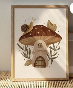 a mushroom house with a snail sitting on it's roof in front of a white wall