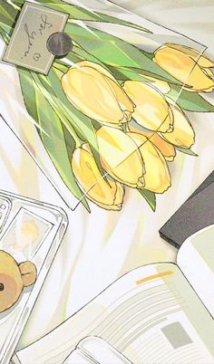 a teddy bear sitting on top of a bed next to yellow tulips and an open book