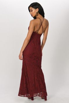 "Feel Those Fancy Feels When You Wear The Joanna Wine Lace Maxi Dress At Your Next Formal Event. This Lace High Neck Maxi Dress Features A Sleeveless Construction, Halter Straps That Criss Cross In The Back, And A Slightly Flared Skirt. This Formal Halter Maxi Dress Will Look Fab With Peep Toe Heels." Strappy Back Dress With Crisscross Straps For Gala, Gala Dress With Crisscross Straps And Strappy Back, Gala Dress With Crisscross Strappy Back, Gala Dresses With Crisscross Spaghetti Straps, Lace Maxi Dress With Spaghetti Straps For Prom, Spaghetti Strap Maxi Dress With Back Opening For Prom, Backless Lace Maxi Dress For Evening, Backless Maxi Dress With Lace Bodice For Prom, Elegant Fitted Maxi Dress With Crisscross Straps