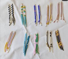 several rows of beaded bracelets laid out on a white tablecloth with text overlay