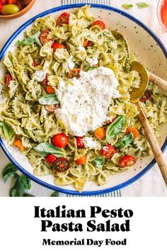 a bowl filled with pasta and cheese on top of a table