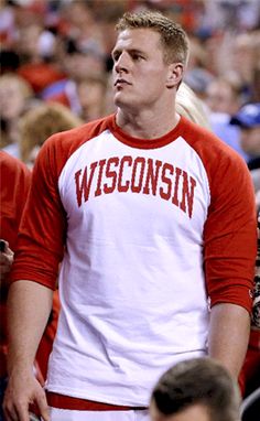 a man in a red and white baseball shirt