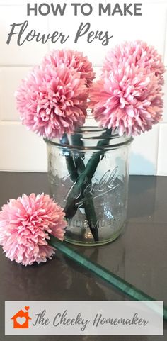 pink flowers in a mason jar with the words how to make flower pens on it