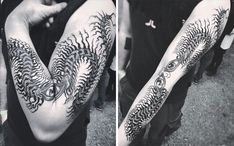 the arm is decorated with black and white tattoos on both sides of the arms are intricate designs