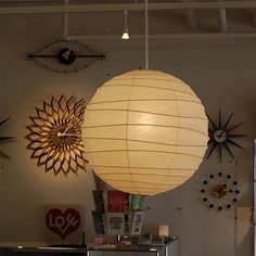 a lamp hanging from the ceiling in a room