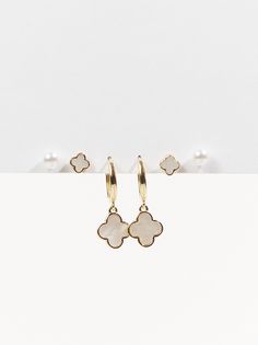 Adorn your ears with the playful charm of these mother of pearl mini clover-shaped earrings. Featuring a delicate clover motif and shimmering mother of pearl details, these earrings can be mixed and matched for the perfect addition to your look. The secure post backings ensure a comfortable and snug fit. Pearl Details, Wedding Branding, Buy List, Clover Earrings, Plus Size Shopping, Accessories Jewelry Earrings, Altar'd State, Bridesmaid Jewelry, Christmas List