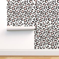 a wall with pink and black leopard print on it