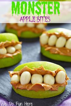 green apples with white teeth and peanut butter on them