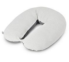 the neck pillow is made from white fabric