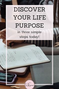 a person writing on a notebook with the text, discovering your life purpose in three simple steps today