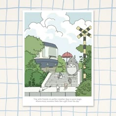 a card with an image of a train coming down the tracks and totoro sitting on a bench