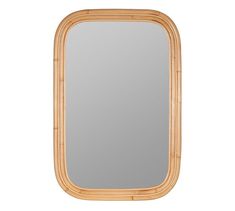 an oval mirror made out of bamboo with a wooden frame on the top and bottom