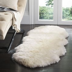 PRICES MAY VARY. [Perfect for any Room]: Available in sizes for any space, this rug is the pinnacle of luxurious style for rustic, boho, glam, farmhouse, contemporary, or transitional types of décor [Quality Product]: Genuine natural premium sheepskin pelt is undyed, unique, and unaltered from the slight variations that add organic qualities to your rug [Luxurious Pile]: Features a 3.4-inch comfortable and luxurious flowing pile thickness for cushioned fluffy softness underfoot Safavieh has been White Shag Rug, White Runners, Fur Rug, Sheep Skin, Sheepskin Rug, Contemporary Interior Design, White Rug, White Area Rug, Handmade Home Decor