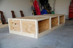 a table made out of plywood in a garage