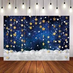 an image of stars in the sky with clouds and light bulbs hanging from the ceiling