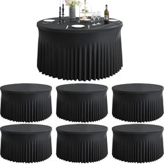 six black round tables with wine glasses on them