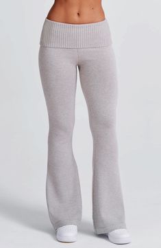 The Portia Knit Pants are a must-have for any wardrobe. These versatile pants feature a flattering fit and flare silhouette. with a wide rib waistband for added style. Complete the look with the matching Portia knit hoodie.   Colour: Light Grey Marl. Regular length. Unlined. Fit and flare silhouette. Wide 2x2 rib waistband. Fold over waistband detail. Internal elastic in waistband. Model is an XS and is wearing an XS. Leggings Flare Outfit, Gray Flared Leggings, Homecoming Dresses Corset, Midi Dress Wedding Guest, Versatile Pants, Maxi Dress Sale, Sparkle Dress, Maxi Dress Navy, Colour Light