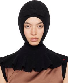 Rib knit wool- and nylon-blend balaclava in black. · Bow accent at face · Scalloped edge at flared collar · Logo embroidered at collar Face masks and face coverings are final sale and are not eligible for return or exchange. Supplier color: Black Shushu Tong, Black Cape, Face Coverings, Black Bow, Scalloped Edge, Logo Embroidered, Face Masks, Final Sale, Apparel Accessories