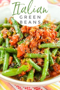 italian green beans with tomatoes and parmesan cheese in a white bowl on a colorful table cloth