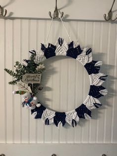 a christmas wreath hanging on the wall