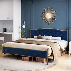 a bedroom with blue walls and gold accents on the headboard, foot board, and bed frame