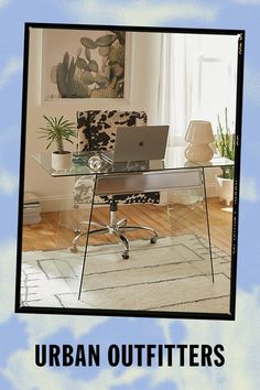 an advertisement for the urban outfitters store featuring a desk with a laptop on it