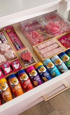 a drawer filled with lots of candy and candies