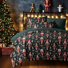 a bed with christmas decorations and lights on it