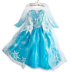 a blue and white dress with snowflakes on it