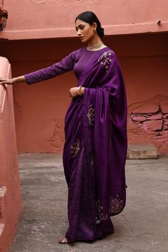 Aubergine half and half saree with big Kalyani boota embroidered and stripe pattern. Paired with blouse.
Component: 2
Pattern: Embroidery
Type Of Work: Kalyani boota, stripe
Neckline: Round
Sleeve Type: Three quarter
Fabric: Silk
Color: Purple
Other Details: 
Bead bordered pallu
Back cut-out
Occasion: Wedding - Aza Fashions Dark Purple Wedding, Half And Half Saree, Full Sleeve Blouse, Purple Saree, Indian Flowers, Embroidered Saree, Silk Saree Blouse, Modern Staircase, Latest Sarees