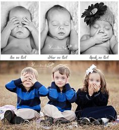 three children are sitting in the grass with their hands on their faces, and one is holding