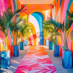 a brightly colored hallway with palm trees and potted plants