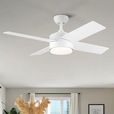 a white ceiling fan in a living room